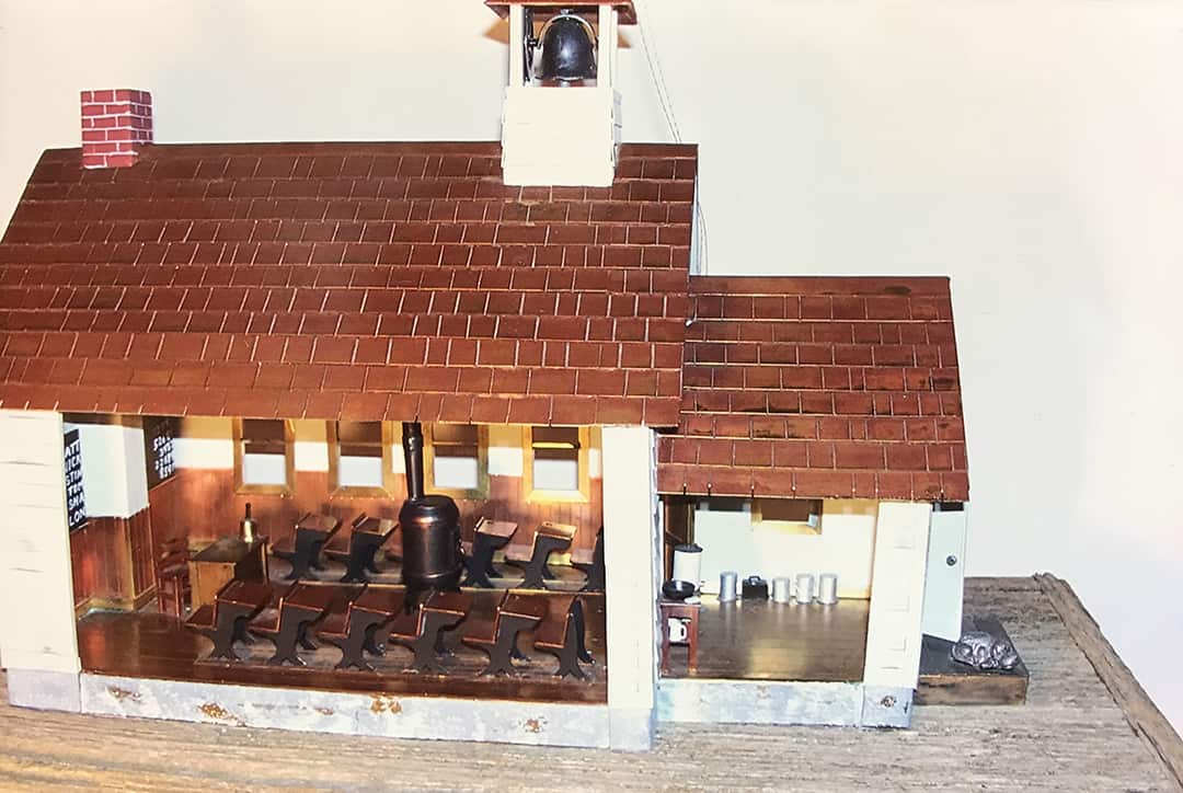 Inside view of model of 1930s schoolhouse